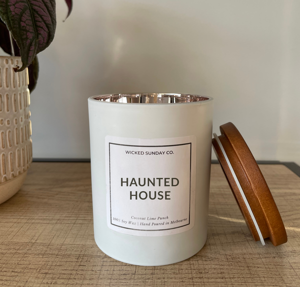 Haunted House Halloween Candle. White / Rose Gold container with wooden lid, 100% soy wax. Hand poured in Melbourne
